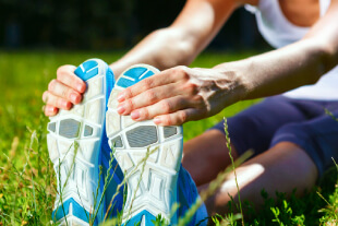 Female runner stretching
