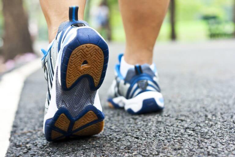 Close up of a walkers feet taking a step