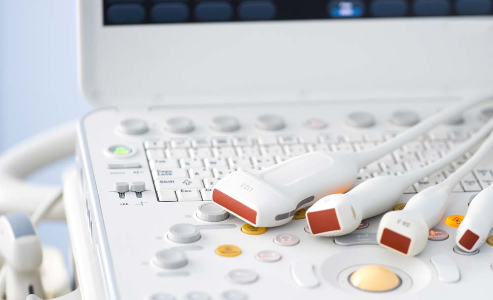 Ultrasound machine and monitor.