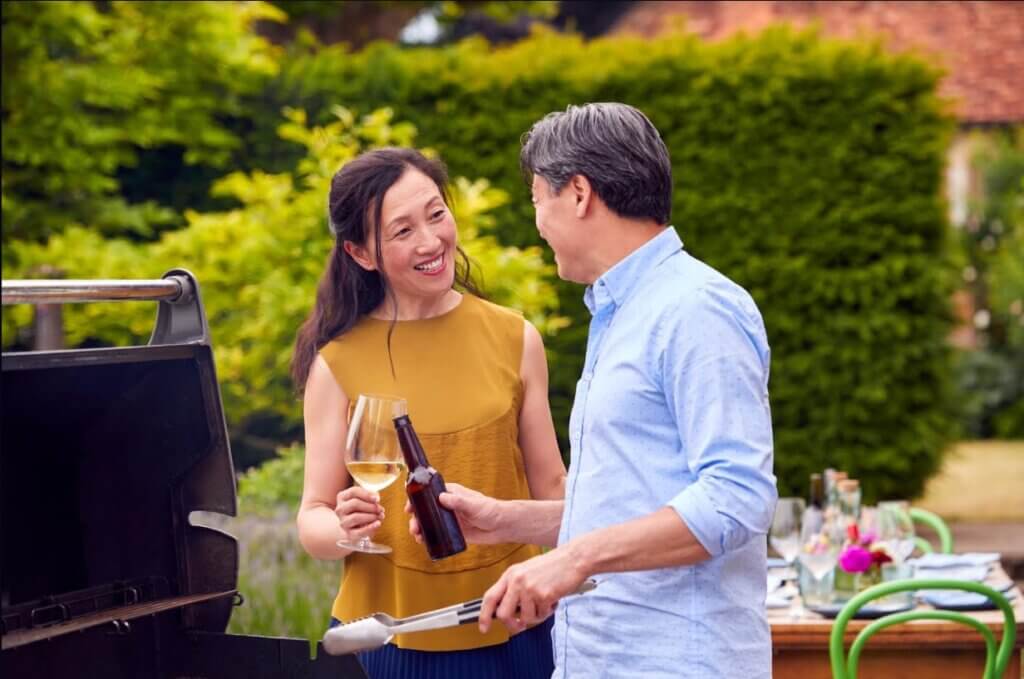 Couple drinking wine and beer